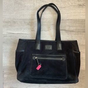 This is a vintage Coach bag, it is also authentic genuine leather!